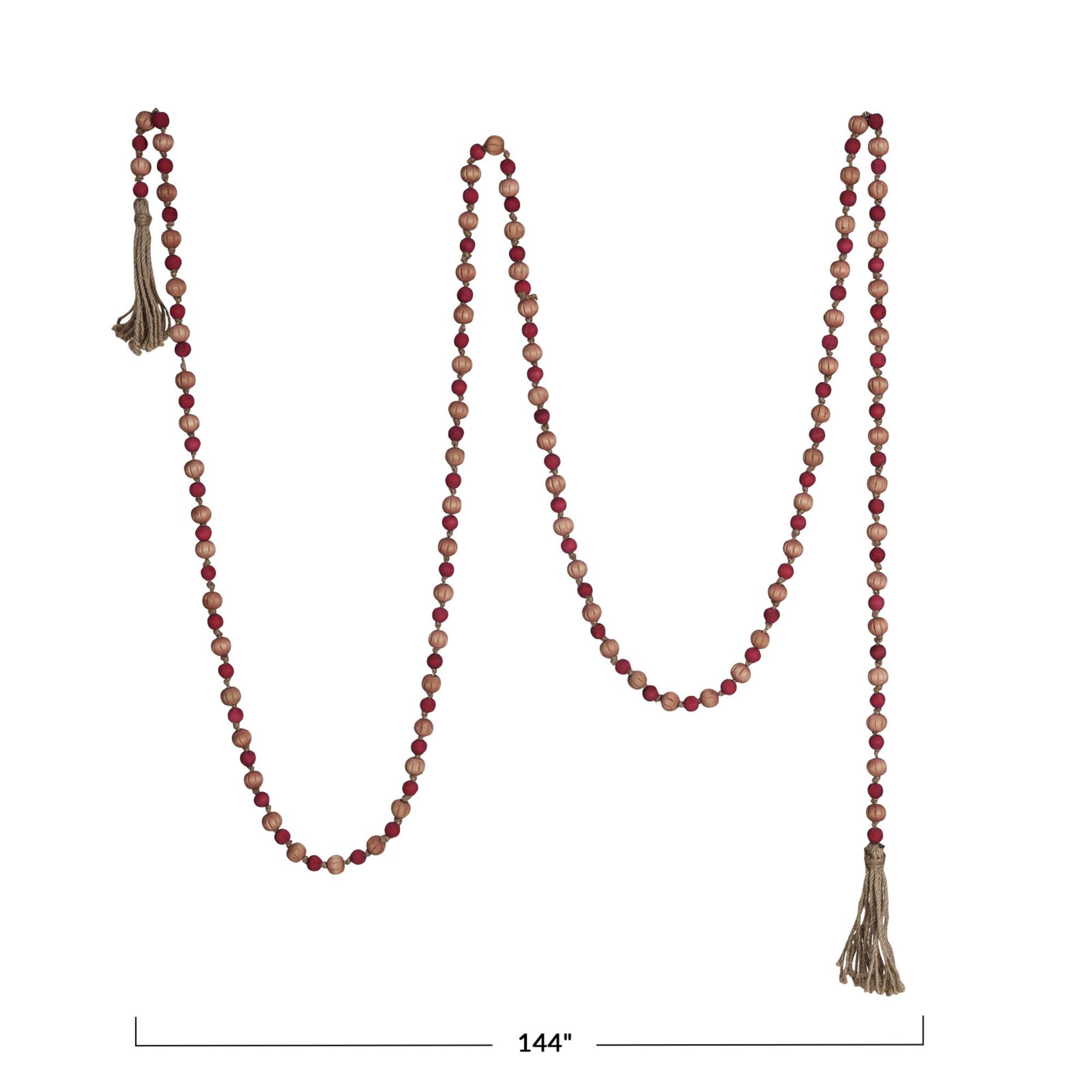 Hello Honey® 12ft. Pink & Red Paulownia Wood Beads with Jute Tassels Garland